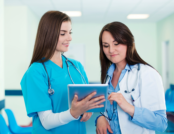 female-doctors-checking-results-digital-tablet