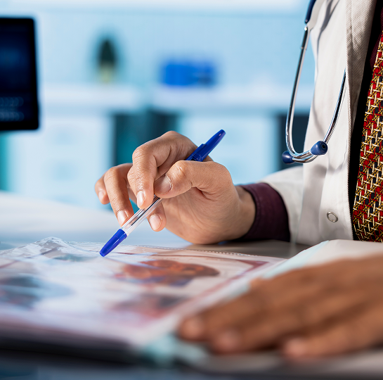 general-practitioner-consulting-patient-reviewing